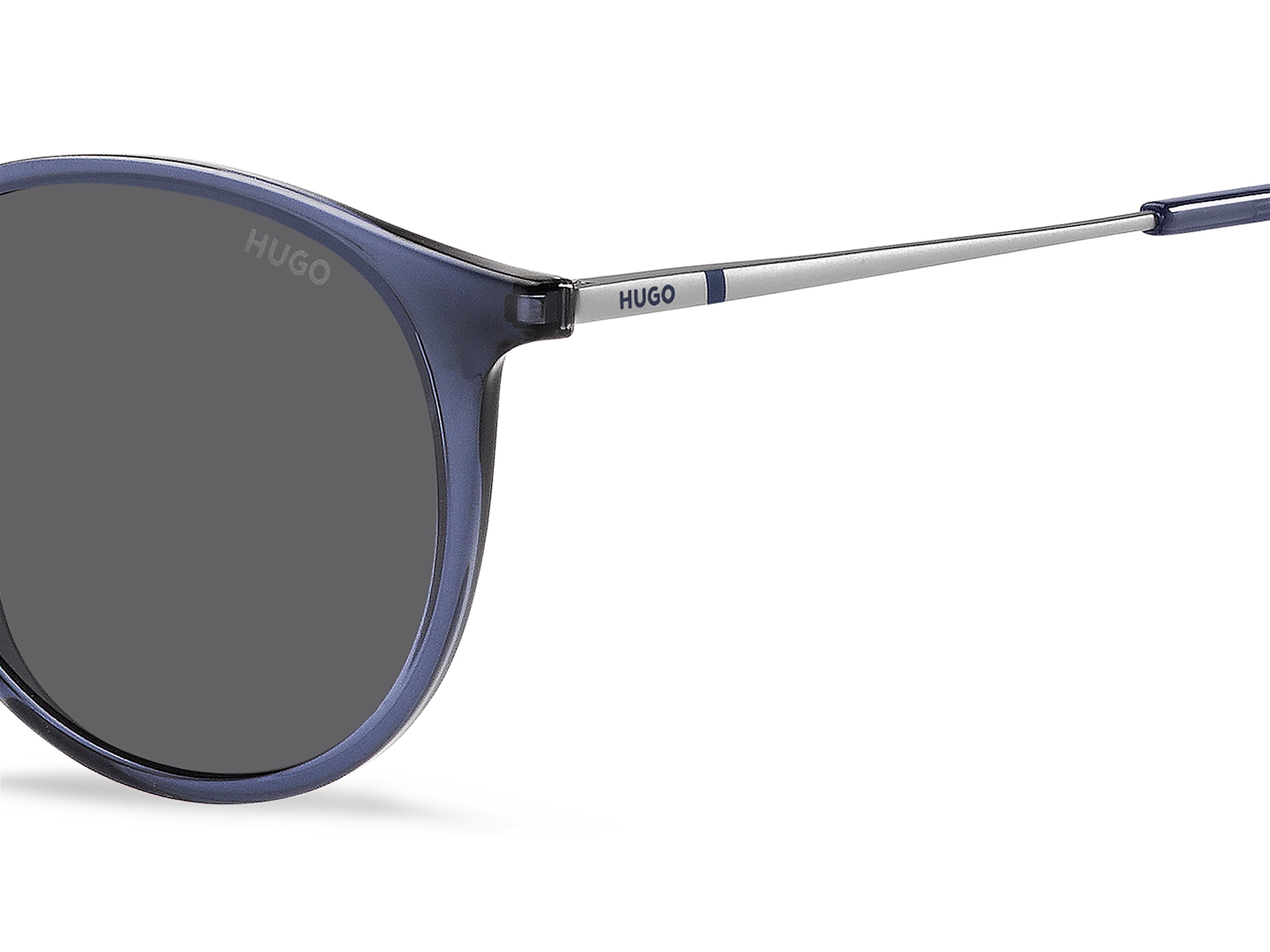 Das Bild zeigt die Sonnenbrille HG1286/S B88 von der Marke Hugo in blau/silber.